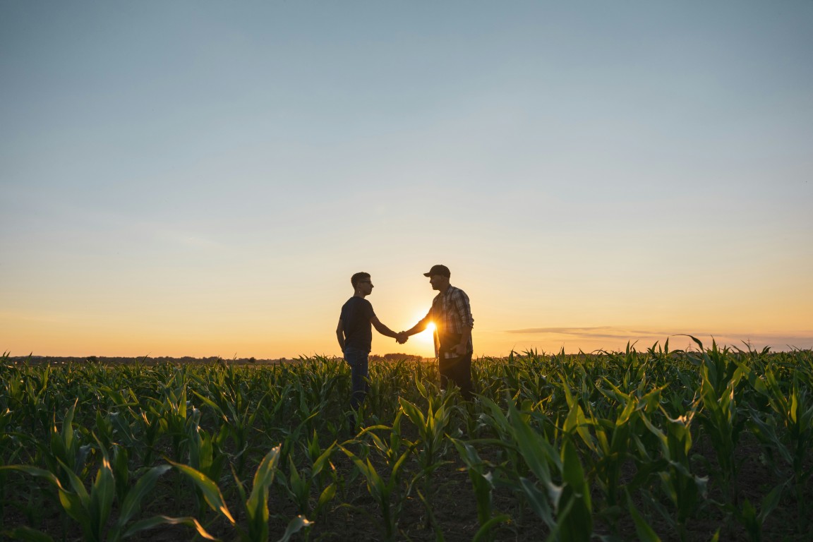 Two farmers shaking hands